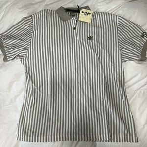 Sage green and white short sleeve men’s polo.